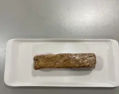 Step <p>Pasamos la masa a una bolsa o a film transparente, le damos forma </p> illustration